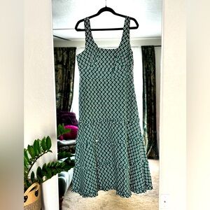 Flattering fit & flare dress. Green with simple white flower pattern.